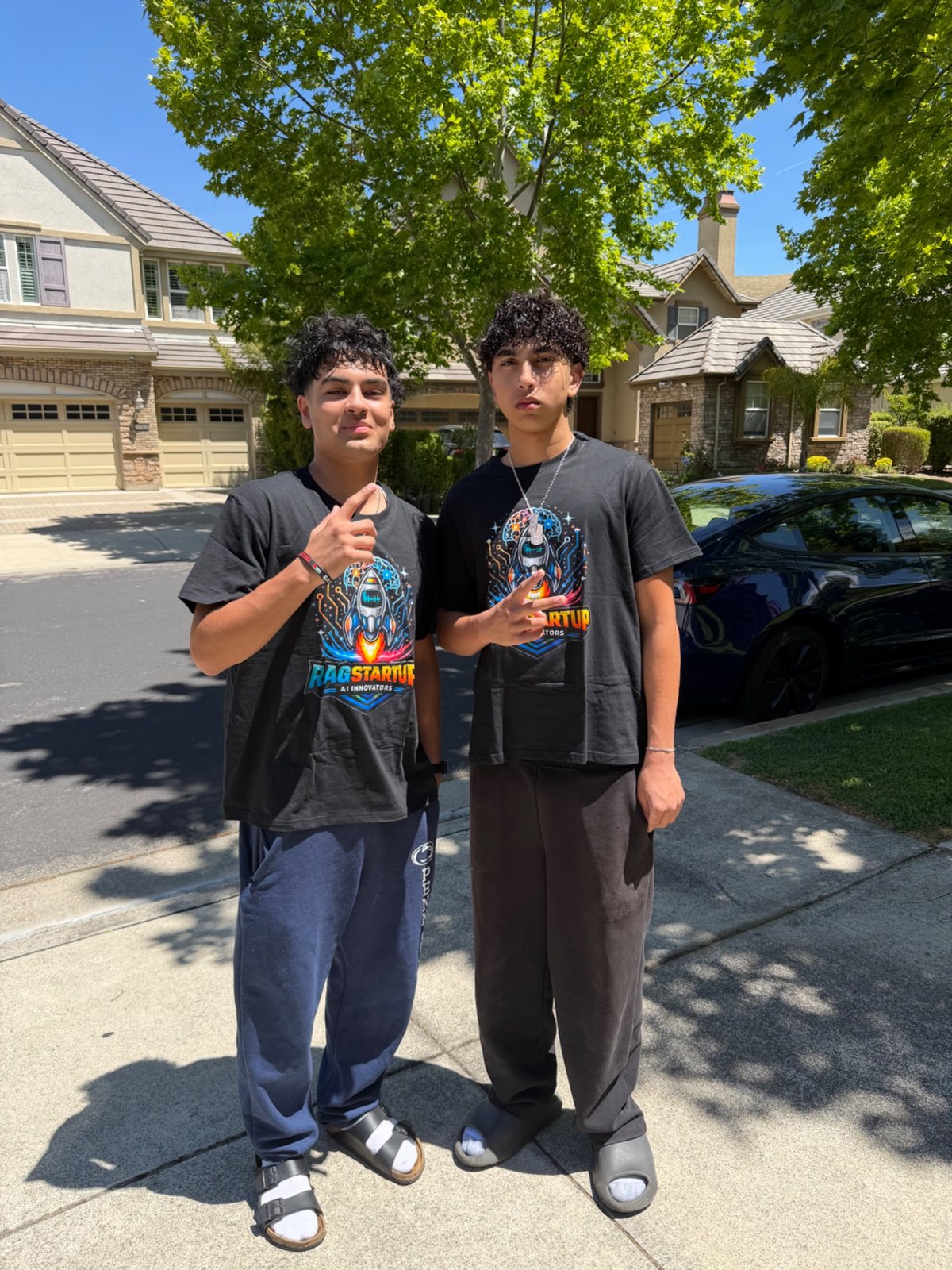Two Founder Offsite participants wearing project shirts